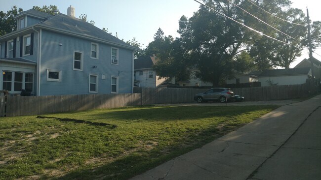 Off street parking next door - 608 S 35th Ave