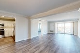 Located at 190 N Shore Rd in Revere, MA, this well-appointed 3-bedroom, 2-bathroom residence offers a clean, modern aesthetic across a thoughtfully designed single-floor layout. Consistent hardwood-style flooring flows throughout the main living areas, complemented by crisp white walls and abundant natural light.

The spacious living room is a standout feature, boasting elegant crown molding and a sliding glass door that opens to a private balcony, inviting natural light and outdoor views. The layout connects seamlessly to the rest of the home via hallways that enhance the sense of flow.

The kitchen is well-equipped with white shaker-style cabinetry, bright white countertops, a stainless steel sink, and a full suite of stainless steel appliances including a range, microwave, and dishwasher — combining both style and functionality.

The generously sized primary bedroom offers ample space and includes closet access, while the two additional bedrooms provide versatility for various living arrangements. Both bathrooms are finished in clean white tile, each featuring a tub-shower combination, vanity with mirror, and brushed nickel fixtures. Two hallway closets add practical storage throughout the home.