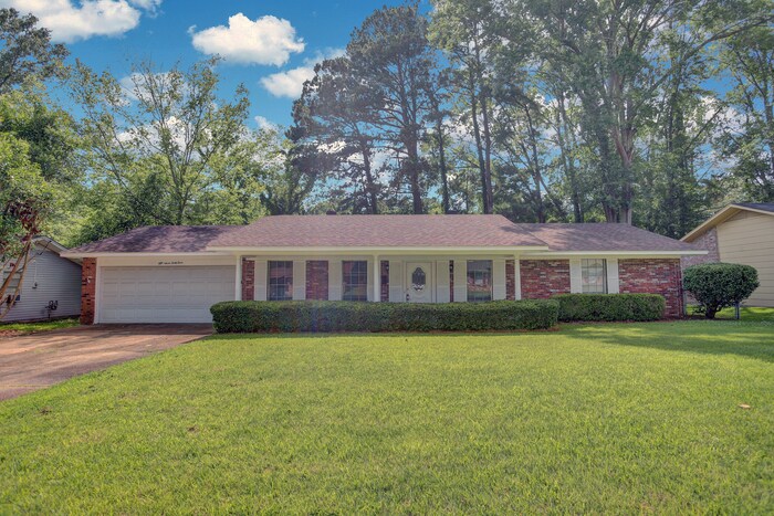 Primary Photo - Charming 3-Bedroom, 2-Bathroom Brick Home ...