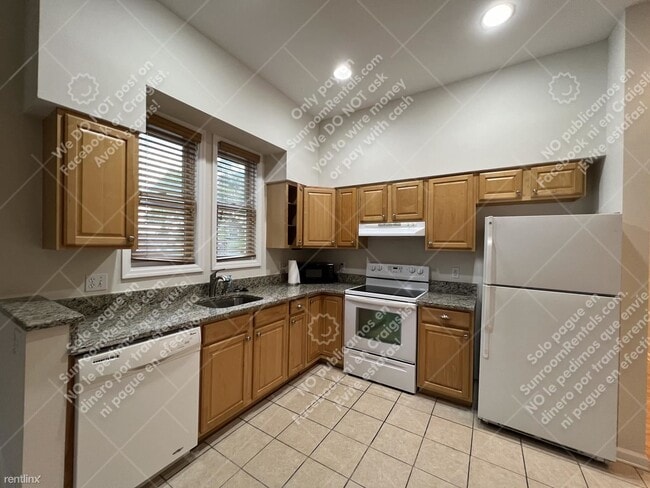 Building Photo - 2 br, 2 bath 4plex - 2006 E 4th Ave B B