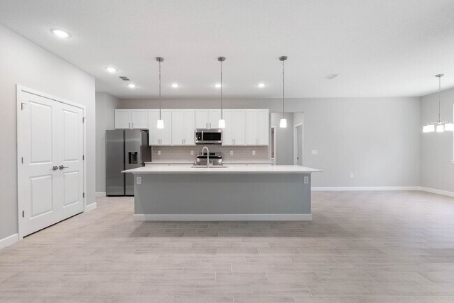 Building Photo - New Modern 4-Bedroom Home with In-Law Suite & Flex Room on Corner Lot