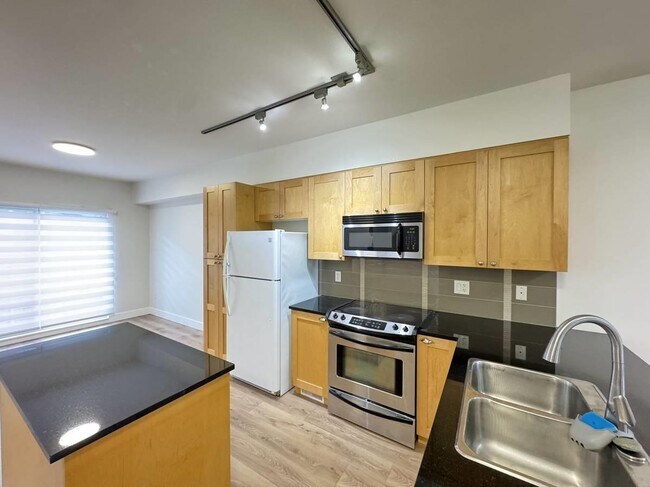 Photo du bâtiment - 19478-19465 65 Ave