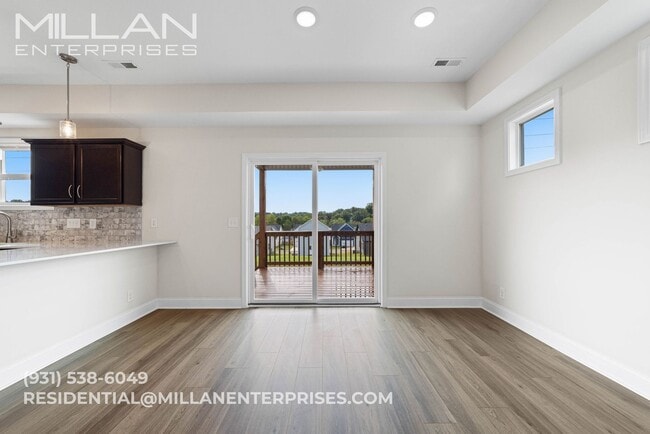 Building Photo - Spacious And Updated Home Featuring Open F...
