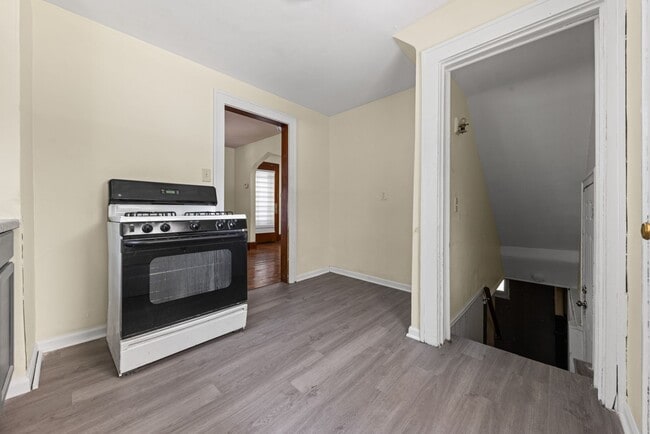 Building Photo - Classic Goodyear Heights Colonial — Hardwood, Arched Dining, Garage + Big Basement