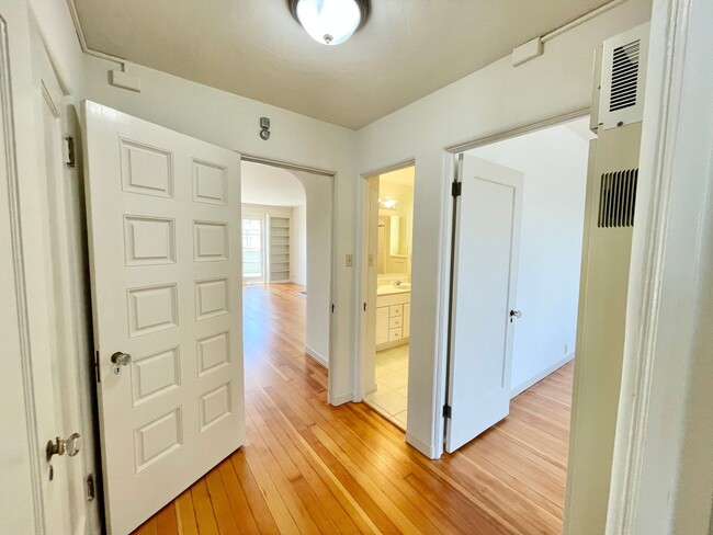 Building Photo - Bright and Airy 2 Bedroom Penthouse in the...