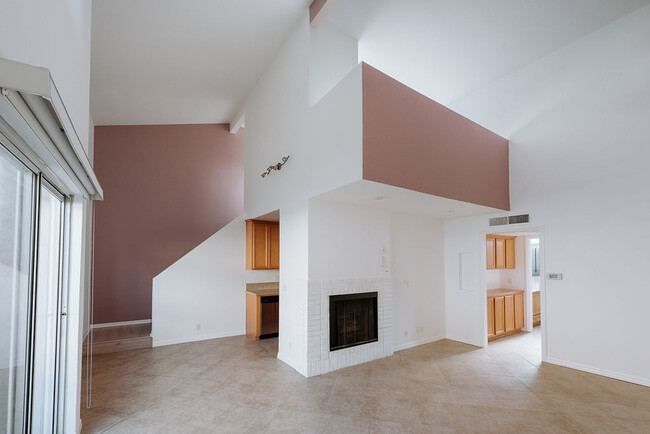 Living area, fireplace, loft overhang - 3651 Jasmine Ave