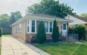Front with 3 car side driveway - 8136 Crawford Ave