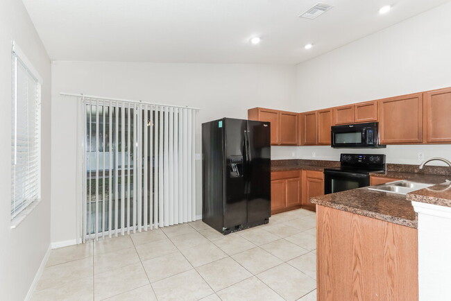 Foto del edificio - 5059 Belmont Park Ln