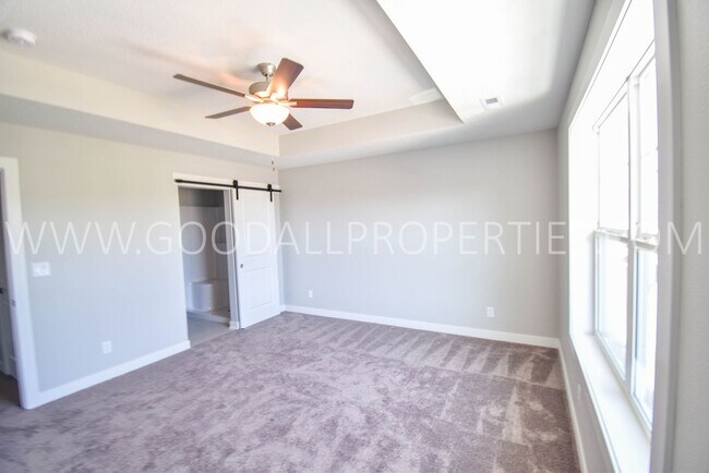 Building Photo - 4 Bdrm 3.5 Bath Townhome with a Walkout Ba...