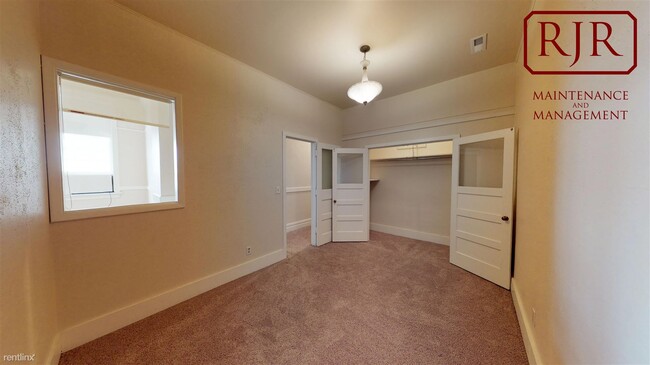 Building Photo - 1 br, 1 bath Apartment - 200 W Main Ave #1