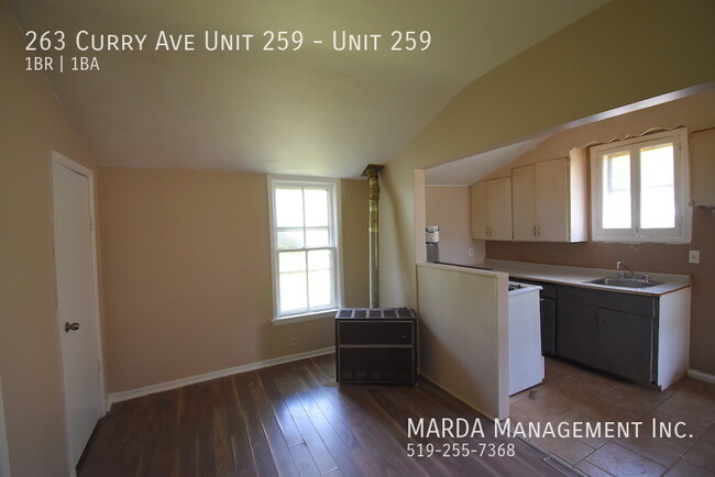 Building Photo - COZY 1-BEDROOM/1BATH MAIN FLOOR APARTMENT ...