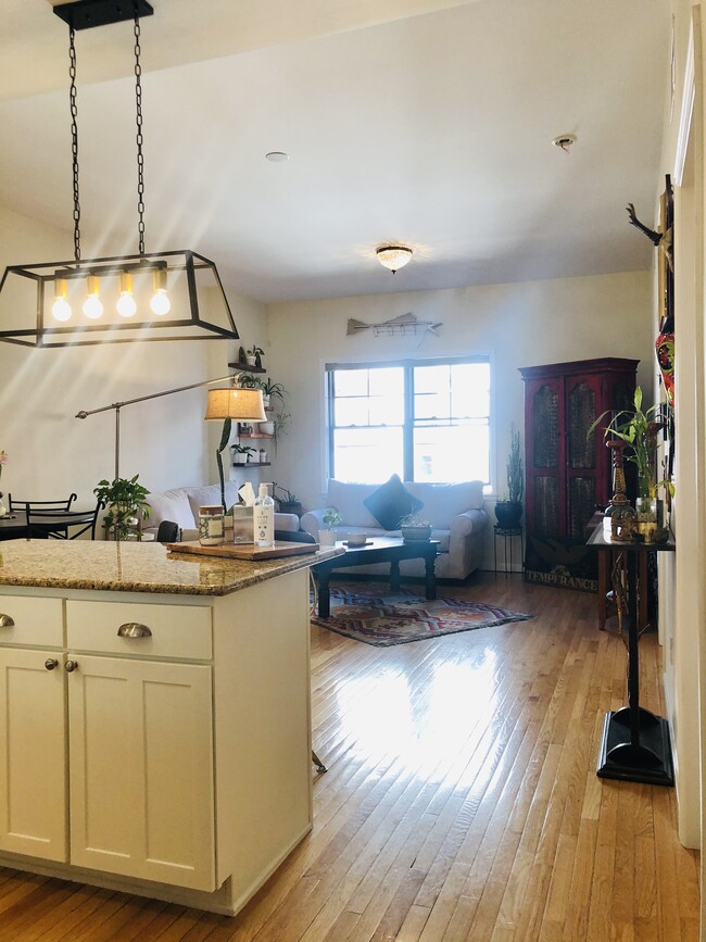 Light and bright with gorgeous hardwood floors - 1950 N Logan St
