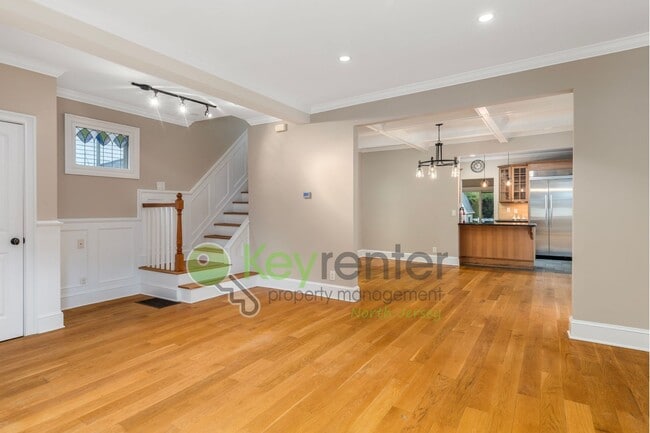 Photo - Spacious 3BR Home with Finished Attic, Fenced Yard & Easy NYC Commute – No Broker Fee