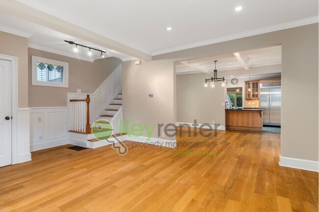 Building Photo - Spacious 3BR Home with Finished Attic, Fenced Yard & Easy NYC Commute – No Broker Fee