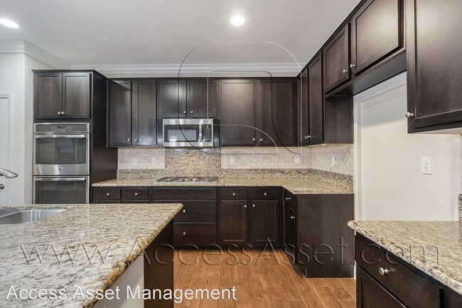 Building Photo - 5 br, 4 bath House - 36552 Geranium Dr