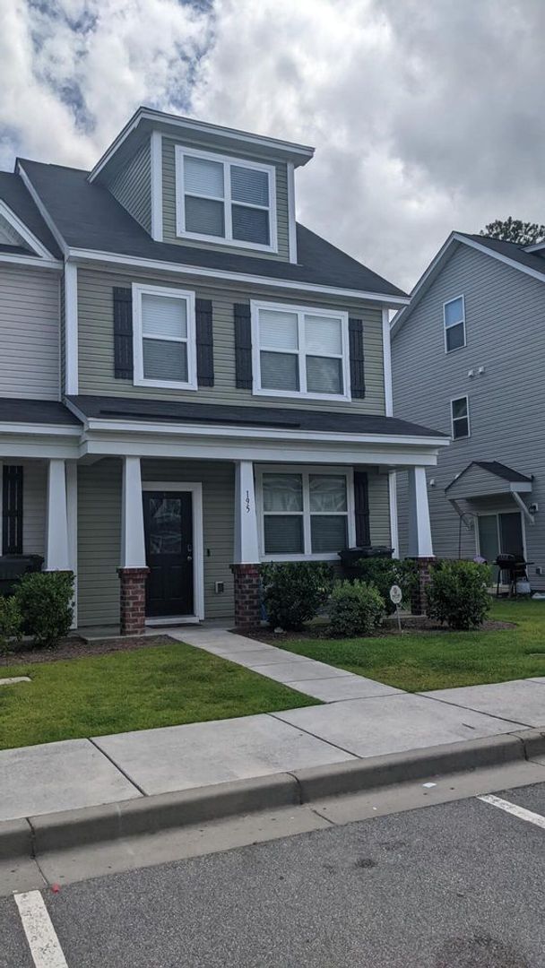 Building Photo - Sun-Filled 3-Story End-Unit Townhome with Fenced Yard, Storage & Resort-Style Pool