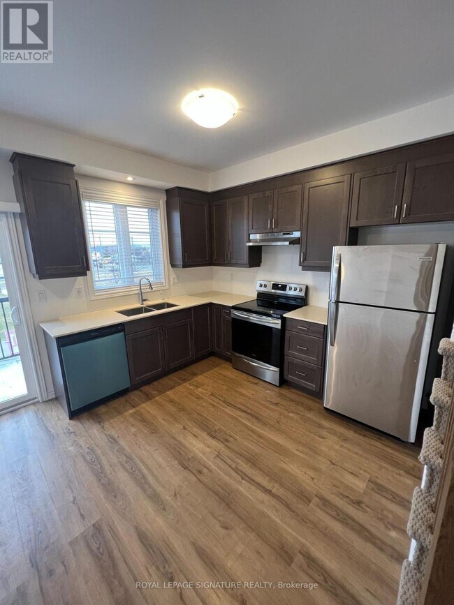 Photo du bâtiment - 575 Woodward Ave