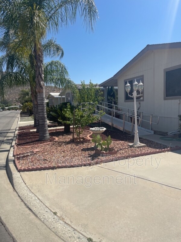 Building Photo - 26057 Fountain Palm Dr