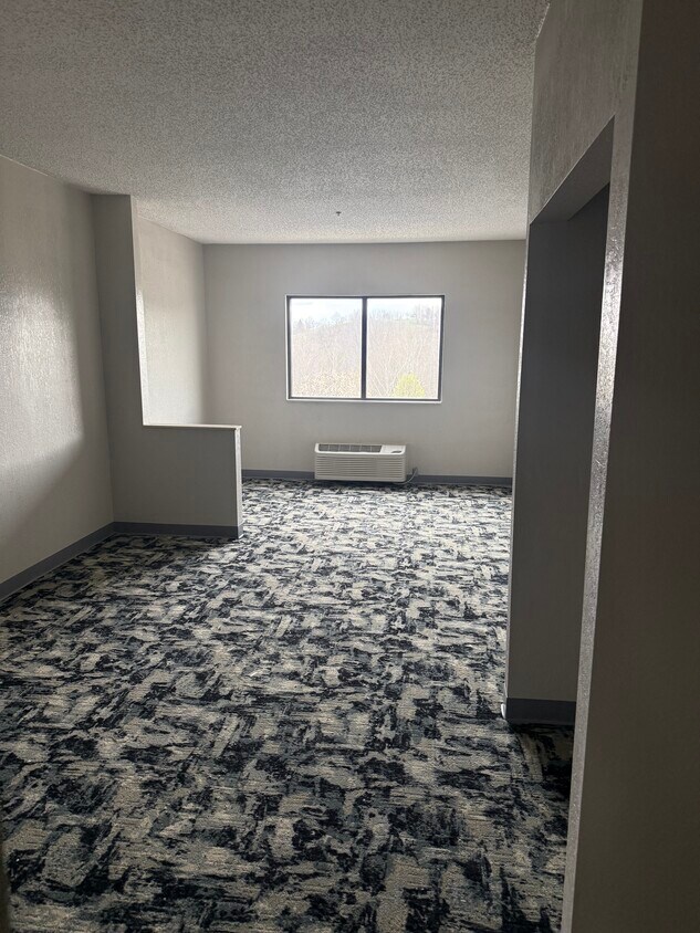 SALA DE ESTAR - Riverbluff Senior Living Apartments