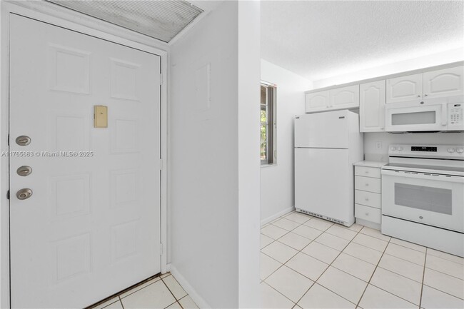 Building Photo - 8770 Royal Palm Blvd