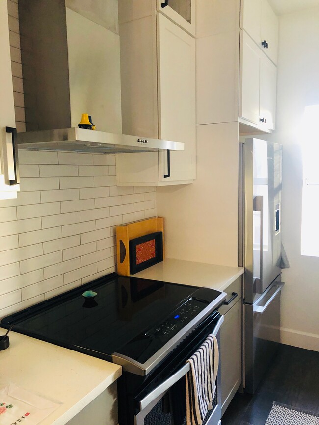 Kitchen with brand new stainless appliances including wine fridge - 1325 Park Ave SW