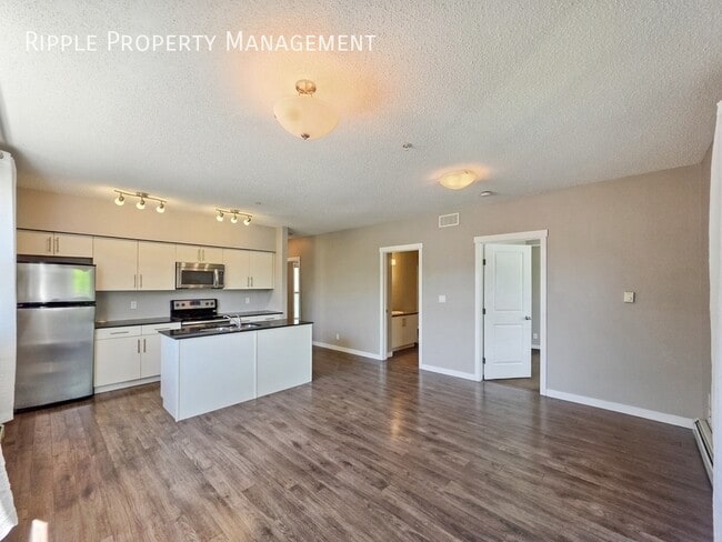 Building Photo - SUN-DRENCHED & SPACIOUS | 3 BEDS, 1 BATH CONDO | PRIME MT PLEASANT LOCATION