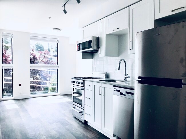 Building Photo - Sleek Modern 1-Bed with Rooftop Patio in the West End – $2,225/mo