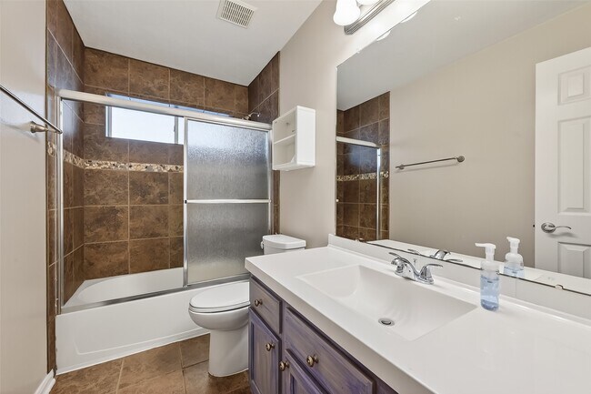 Foto del edificio - 10827 Oak Bayou Ln