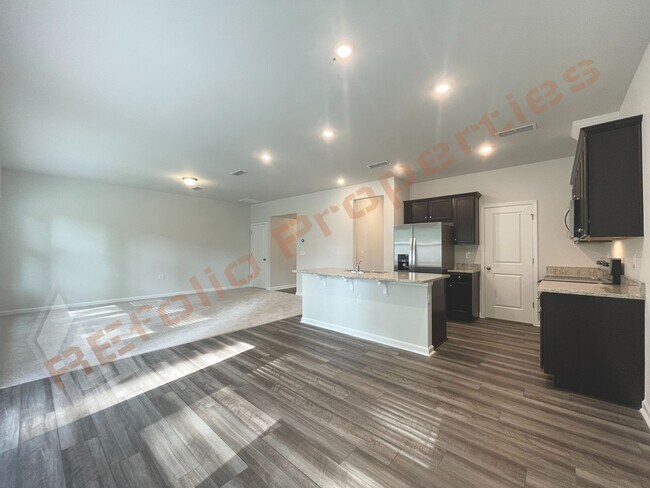 Building Photo - BRAND NEW Beautiful Townhouse Backed to Wo...