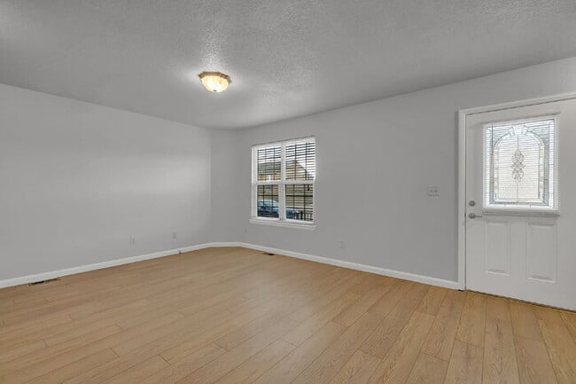 Building Photo - Fully Renovated 2-Bedroom Townhome Near Ft. Carson with 2-Car Garage
