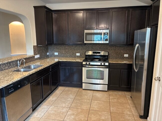 Building Photo - 3BR SFR • Tile Kitchen • Assigned Covered Parking • Austin
