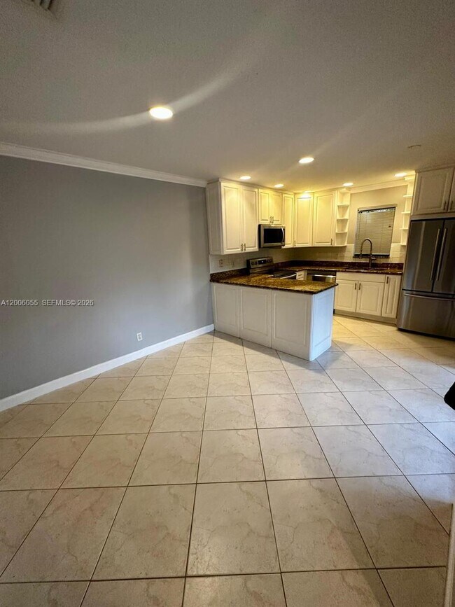 Foto del edificio - 7671 Courtyard Run W