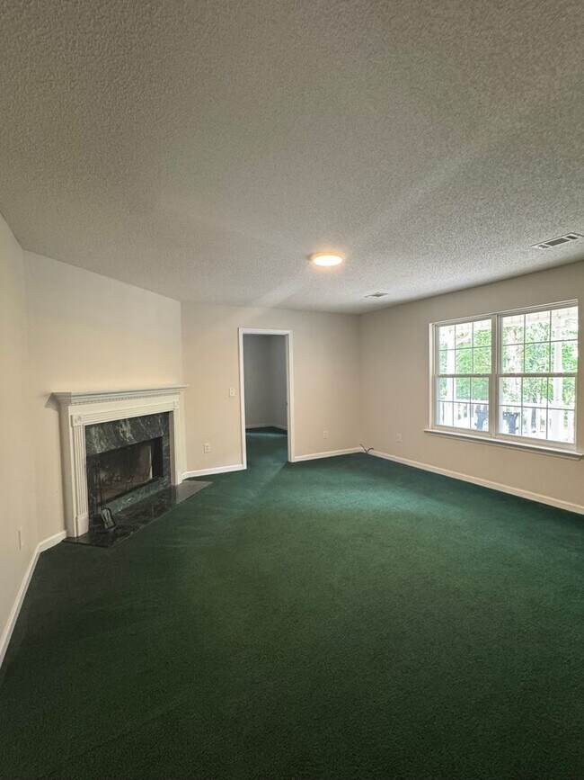 Building Photo - Spacious 4-Bedroom Home on Large Corner Lo...