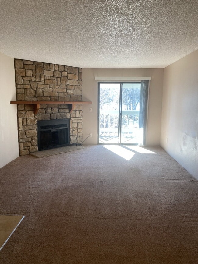 Photo - "Charming 1-Bedroom Condo with Cozy Fireplace and Garage in Prime Denver Location!"