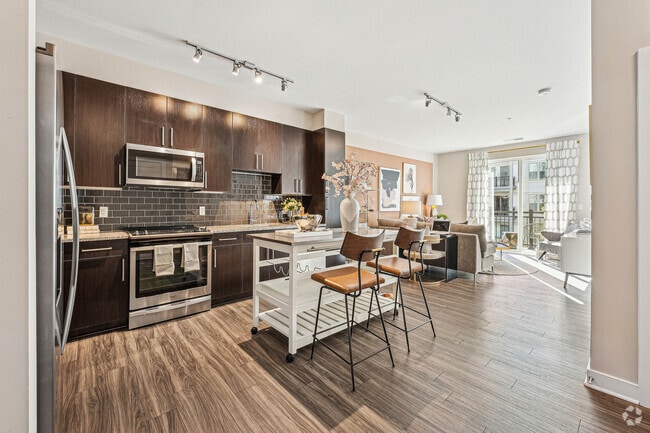 Modern kitchen with sleek finishes. - The Heights at Goose Creek Village