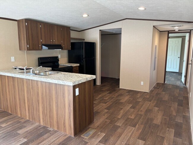 Foto del edificio - BRAND NEW 3 BED, 2 BATH MOBILE HOME IN PARK LOCATED IN EAGLE SPRINGS
