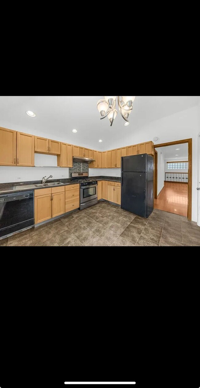 Foto del edificio - 3841 S Lowe Ave