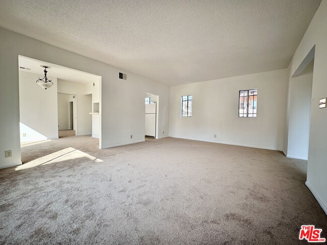 Building Photo - 6069 1/2 Cashio St