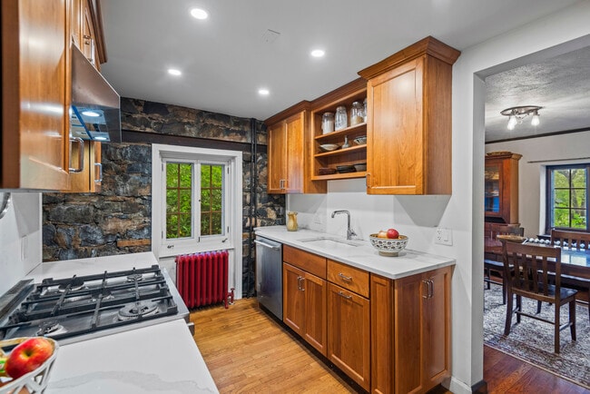 kitchen with exposed stone walls - 128 Blake Rd
