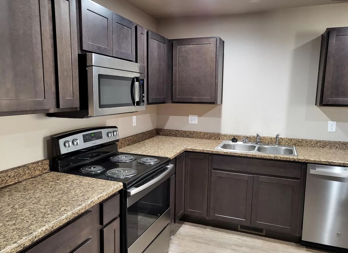 Primary Photo - Pueblo West Apartments