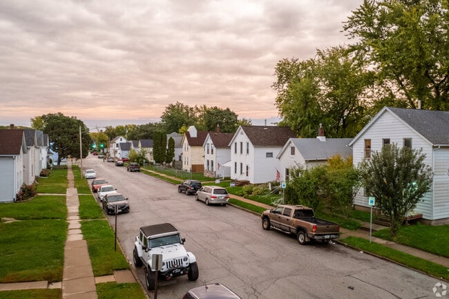 The sunset over a residential neighborhood in Davenport.