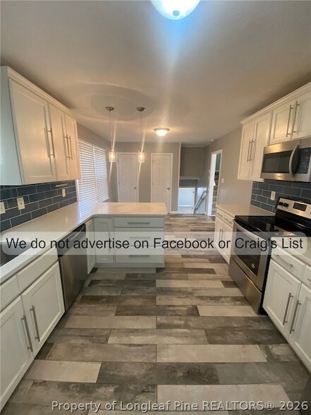 Foto del edificio - 7303 Godfrey Dr