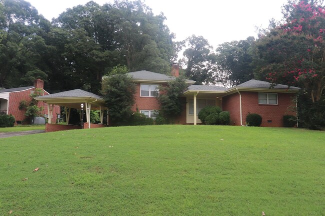 Building Photo - For Rent – Spacious 4BR Mid-Century Modern...