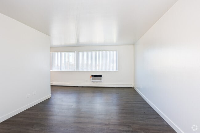 3BR, 2BA - 921SF - Living Room - Grace Apartments