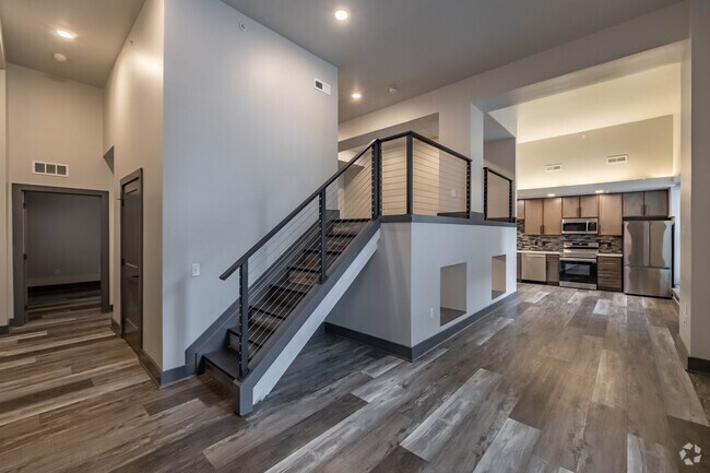 1 habitación, 2 baños, 1400 pies cuadrados, sala de estar - The Vibe Apartments