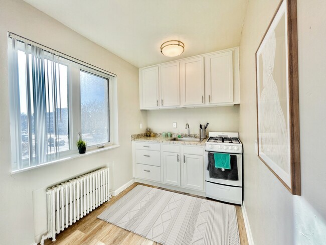 1 dormitorio - Cocina - The Capri Apartments