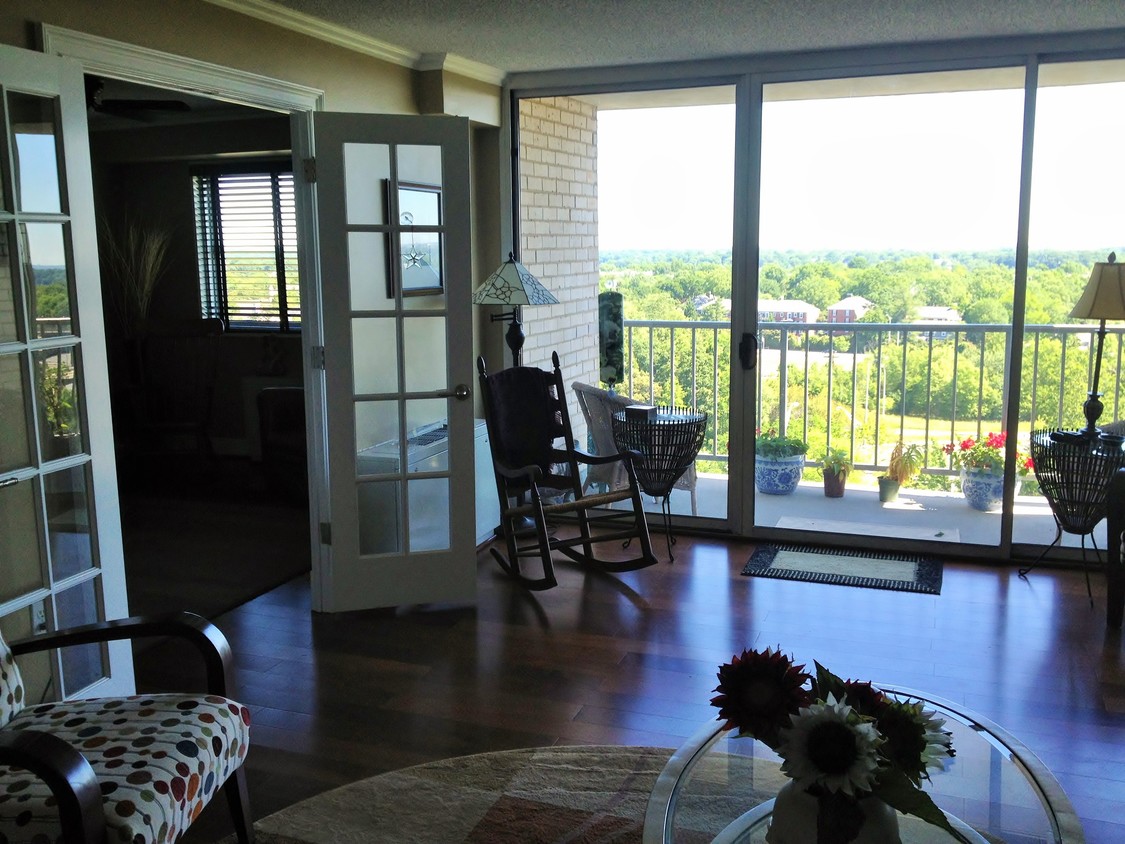 large living room and balcony - 2500 N Van Dorn St