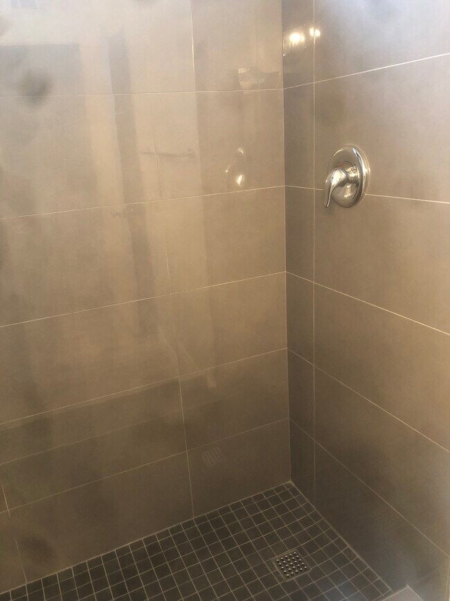 Newly tiled shower #1 - 3366 Pine Ave