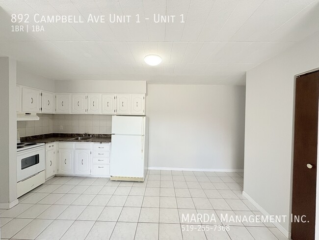 Building Photo - COZY 1 BED/1 BATH MAIN FLOOR -CLOSE TO U OF W + HYDRO!