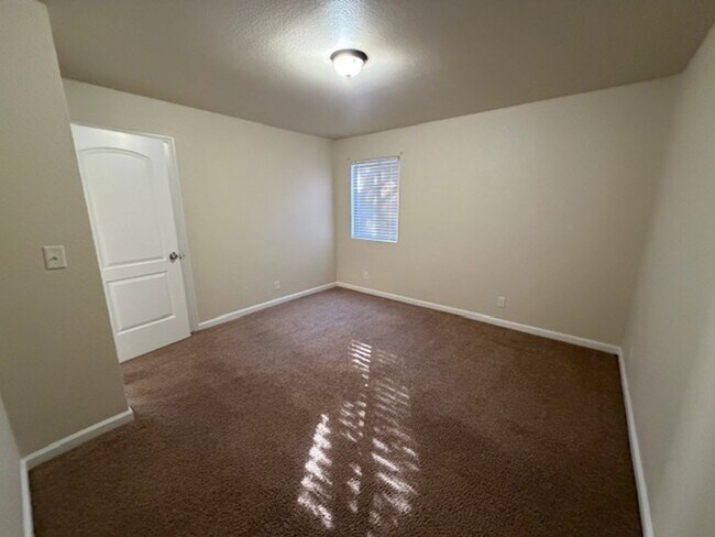 Building Photo - New Paint AND a Yard with a picket fence!